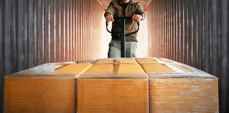 Workers Unloading Package Boxes on Pallets in Container Truck. Cartons, Parcel Boxes. Deliver Parcels to Customers. Supply Chain Shipment Goods. Distribution Supplies Warehouseの写真素材