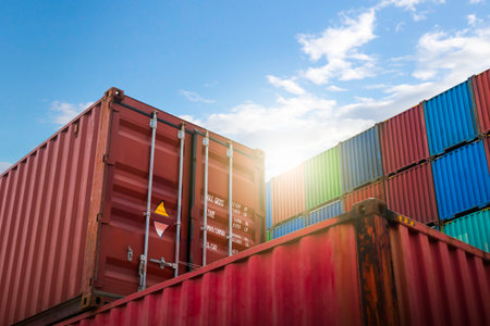 Stacked Containers Cargo Shipping with A Blue Sky. Handling of Logistics Transportation Industry....