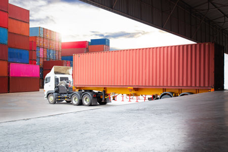 Semi Trailer Trucks on The Parking Lot. Truck Loading at Dock Warehouse. Shipping Cargo Container Delivery Trucks. Distribution Warehouse, Freight Trucks Logistic, Cargo Transport.の写真素材