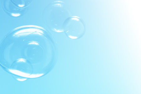 Beautiful Transparent Soap Bubbles Floating in The Air. Soap Sud Bubbles Water. Abstract Backgroundの写真素材
