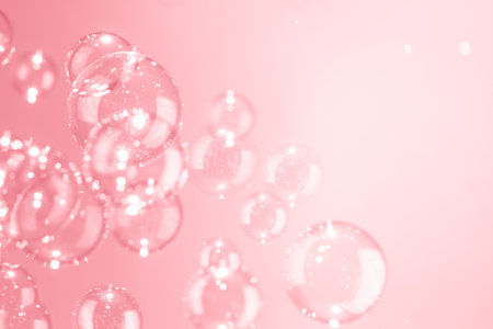 Beautiful Transparent Shiny Pink Soap Bubbles Floating in The Air. Abstract Background, Pink...