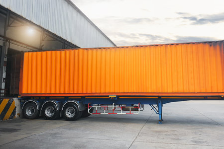 Container Trucks Loading at Dock Warehouse. Container Shipping. Distribution Warehouse Shipping....