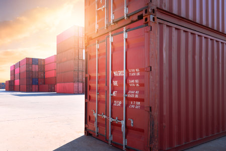 Containers Cargo Shipping. Handling of Logistics Transportation Industry. Freight Trucks Import-Export. Distribution Warehouse Port. Shipping Logistics Transport Ships.の写真素材