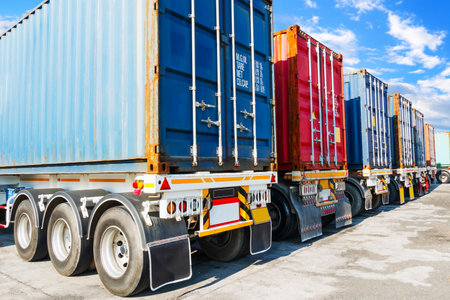 Semi Trailer Trucks on The Parking Lot. Shipping Cargo Container. Handling of Logistics...