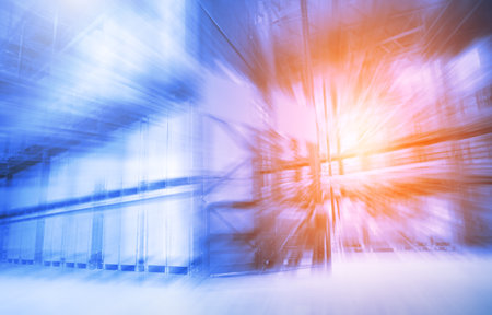 Blurred Warehouse Space for Logistics Industry. Tall Shelves Storage Warehouse. Forklift Loader. Supply Chain, Shipment Goods. Distribution Shipping Warehouse, Logistic Transportの写真素材