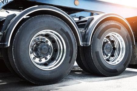 Big Truck Wheels Tires. Chrome Rims, Alloy Wheels. Big rig, Semi Trailer Truck Wheels. Freight Truck Logistics Transport.の写真素材
