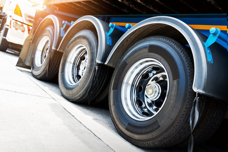 Big Truck Wheels Tires. Chrome Rims, Alloy Wheels. Big rig, Semi Trailer Truck Wheels. Freight Truck Logistics Transport.の写真素材
