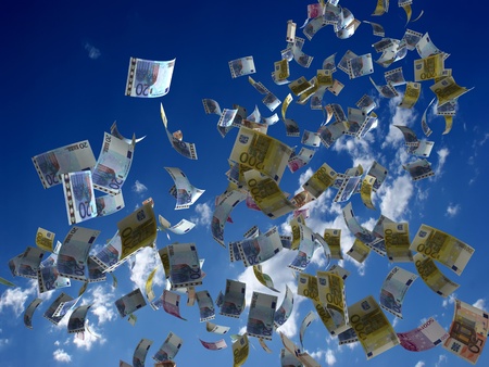 Money denominations on a background of the skyの写真素材
