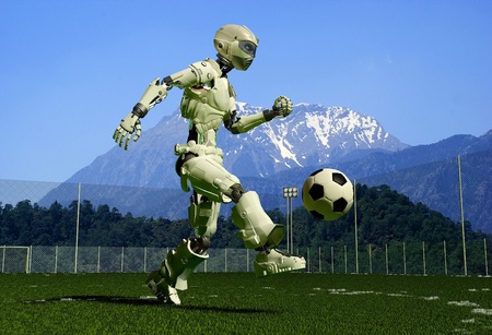 A mechanical robot ran on the green grass.の写真素材