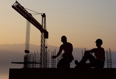 Work on the construction at night      の写真素材
