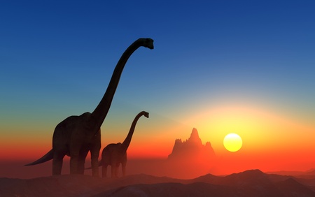 Giant dinosaur in the background of the colorful sky.の写真素材