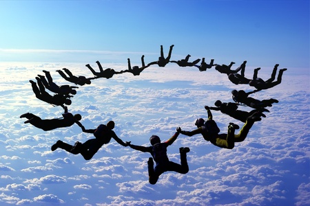 The group of athletes in the sky.の写真素材