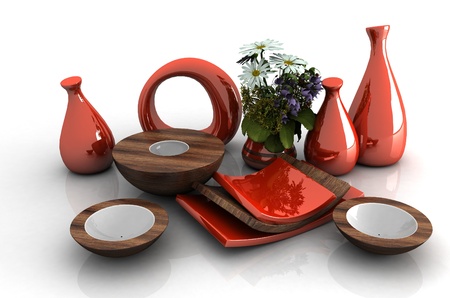 Ceramic tableware and flowers on a white background.の写真素材