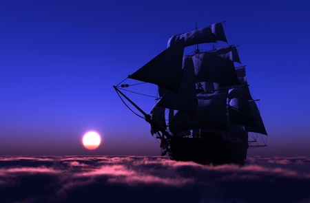Old ship with sails in the mist.の写真素材