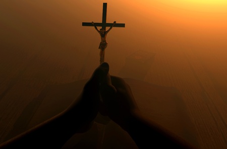 Crucifixion in the hands of a believer.の写真素材