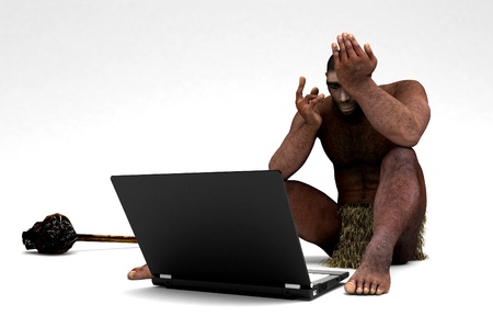 Primitive man with a laptop on a white background.の写真素材