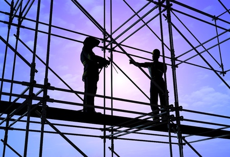 Group of workers talk among themselves.の写真素材