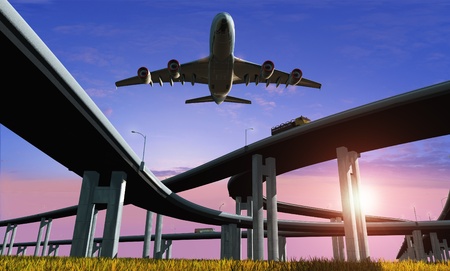 Highway and the aircraft against the evening sky.の写真素材