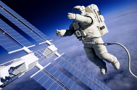 Astronauts in space around the solar battarei.の写真素材