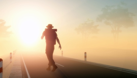 Silhouette of a man on the road.の写真素材