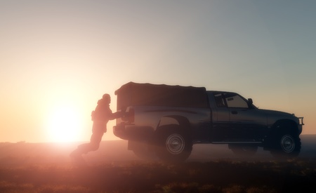 Silhouette of man and the car.の写真素材