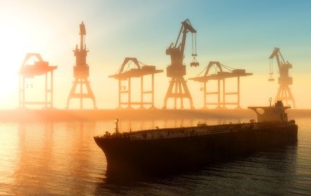 Cranes at a port in the eveningの写真素材