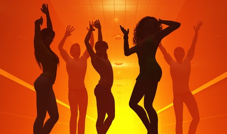 Silhouettes of people who dance.の写真素材
