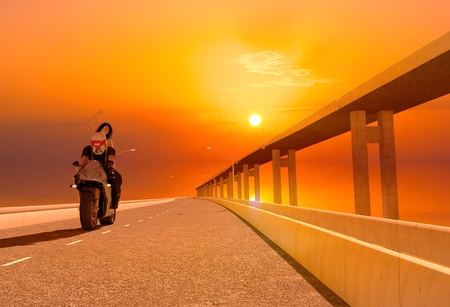 Biker  on the highway skylineの写真素材