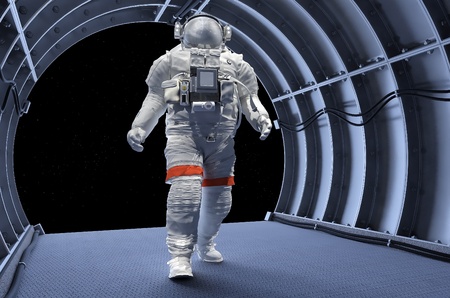 Astronaut in the tunnels of the spacecraft.