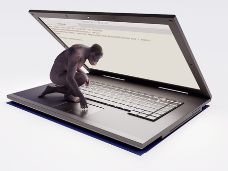Primitive man with a laptop on a white background.の写真素材