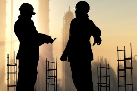 Group of workers talk among themselves.の写真素材