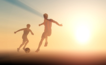 Silhouettes of soccer players.の写真素材
