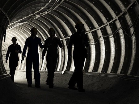 Silhouette of workers in mine