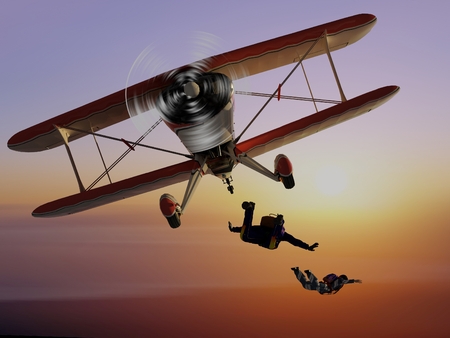 Plane in the sky and parashutist.の写真素材