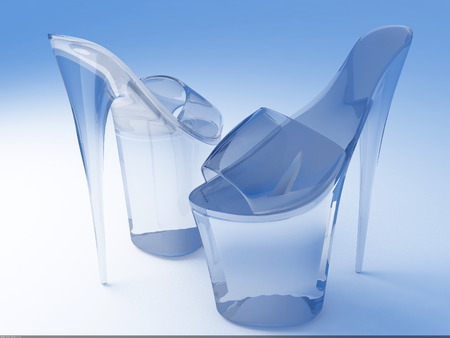 Glass shoes on a blue background.の写真素材
