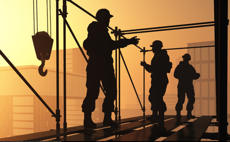 Silhouettes of workers against the background of the city.の写真素材