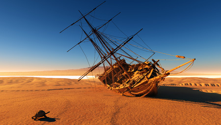 Old sailboat on the bottom of the dried sea.の写真素材