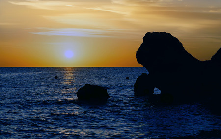Colorful sunset on the beach.の写真素材