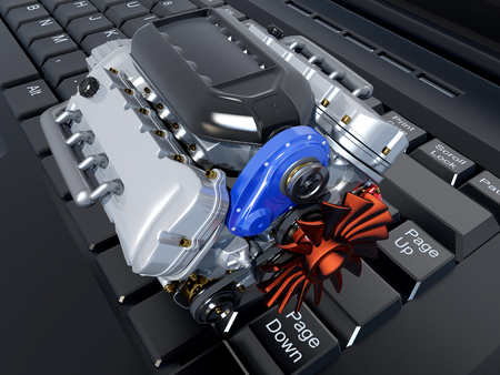 The car's engine on a laptop.