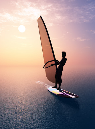 Man with a sail in the sea.の写真素材