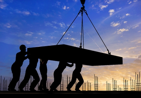 A group of workers at a construction site pushes the plate.,3d renderの写真素材