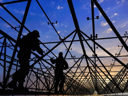 Silhouette of the workers on a background of the sky  ,3d render