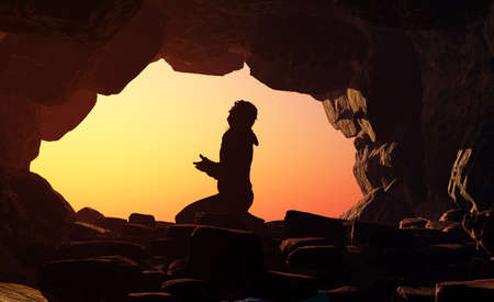 Man praying in the cave.3d renderの写真素材