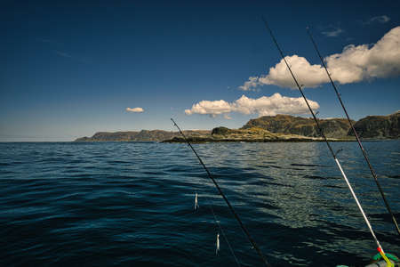 fishing in norway, selje. A paradise for fishing vacations. enjoy the breathtaking landscape by boat. Mountains, sea, fjord and fish.の写真素材