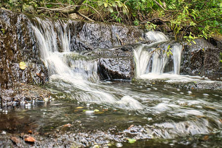 swedish brooks, rivers with small and big waterfalls in untouched nature. recreation, adventure and a lot of relaxation in incomparable nature.の写真素材