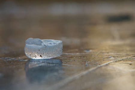 Ice pieces on a lake at sunset in winter atmosphere. cold seasonの写真素材