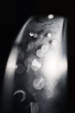 Water drops Abstract and with blurred background shines on a metal surface of a chair. Abstract...