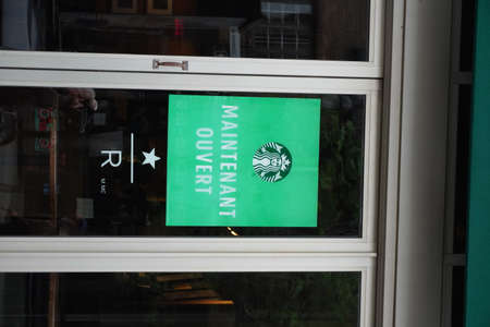 Montreal, Quebec / Canada - June 09, 2020: Starbucks that we are open.のeditorial素材