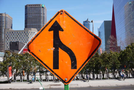 Montreal, Quebec / Canada -April 25, 2020: A street sign behind the buildings in downtown.のeditorial素材
