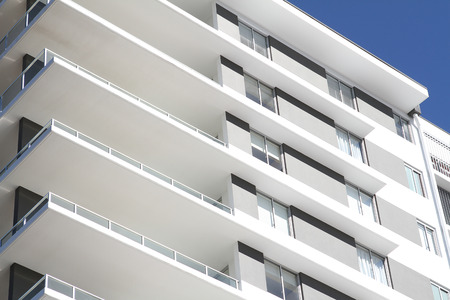 Modern Residential Apartment Block. Mostly white, located in tropical Queensland